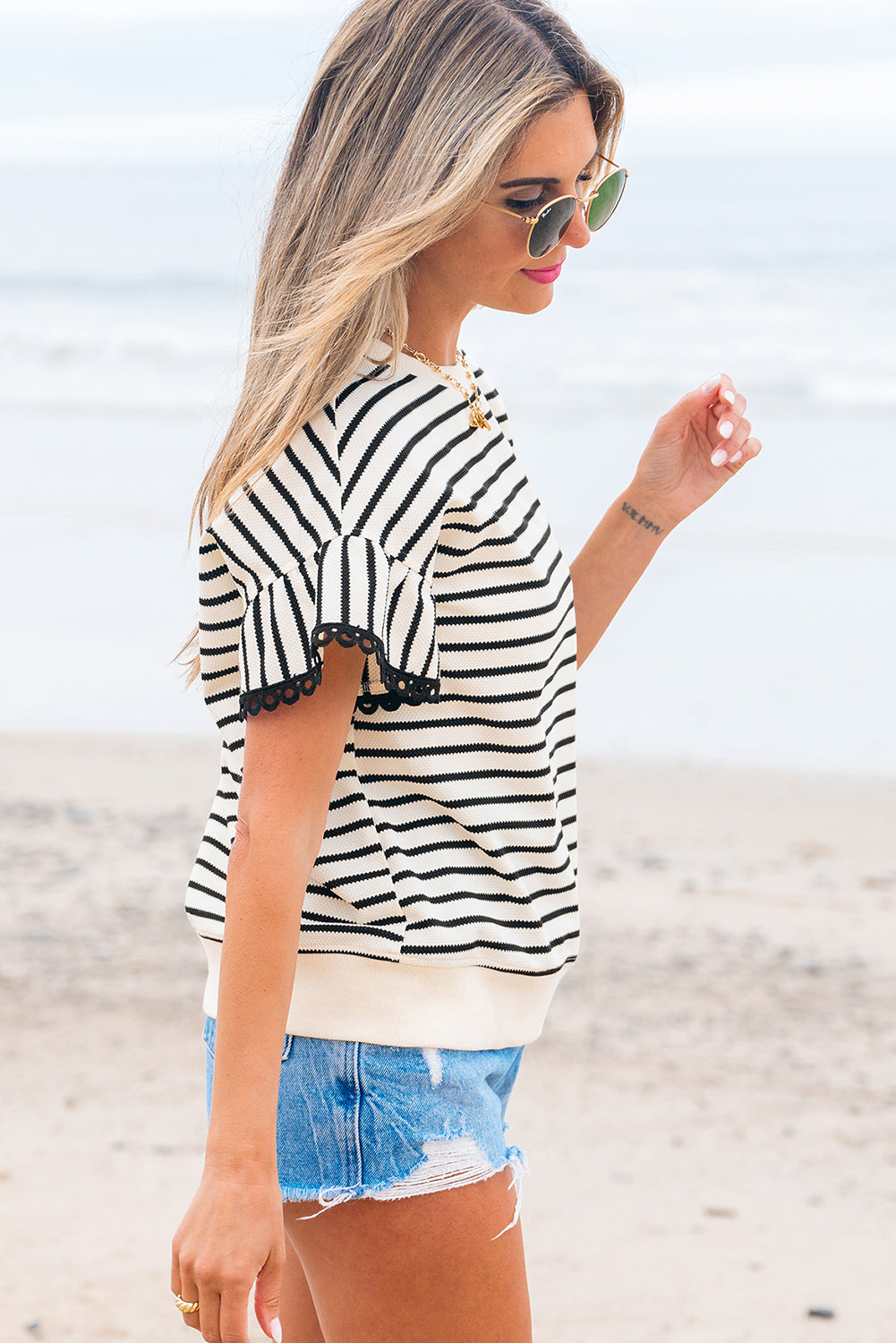 Black Striped Crew Neck Top with Scalloped Lace Trim and Short Ruffled Sleeves