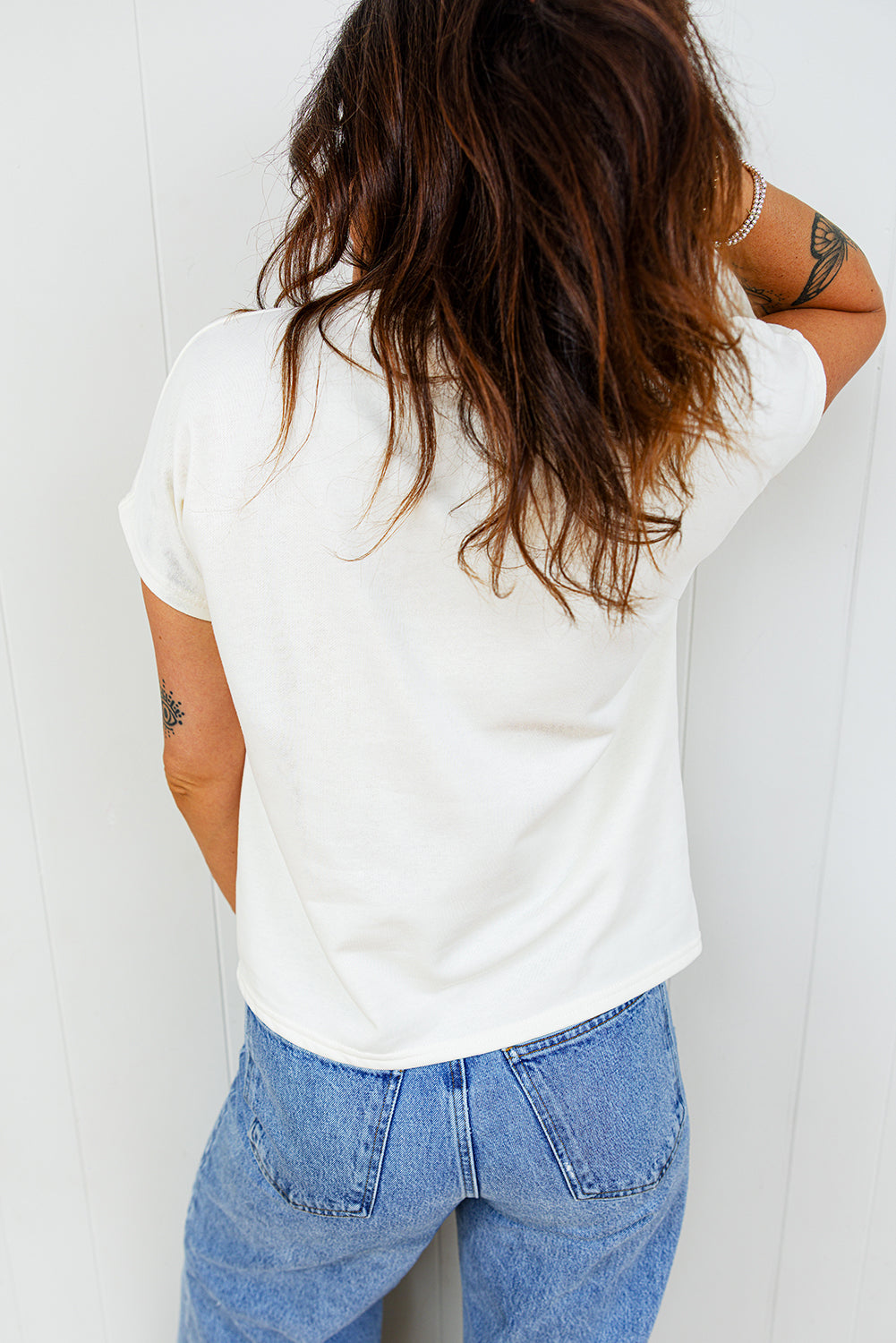 Cotton T-shirt with embroidered leopard bow and crew neck