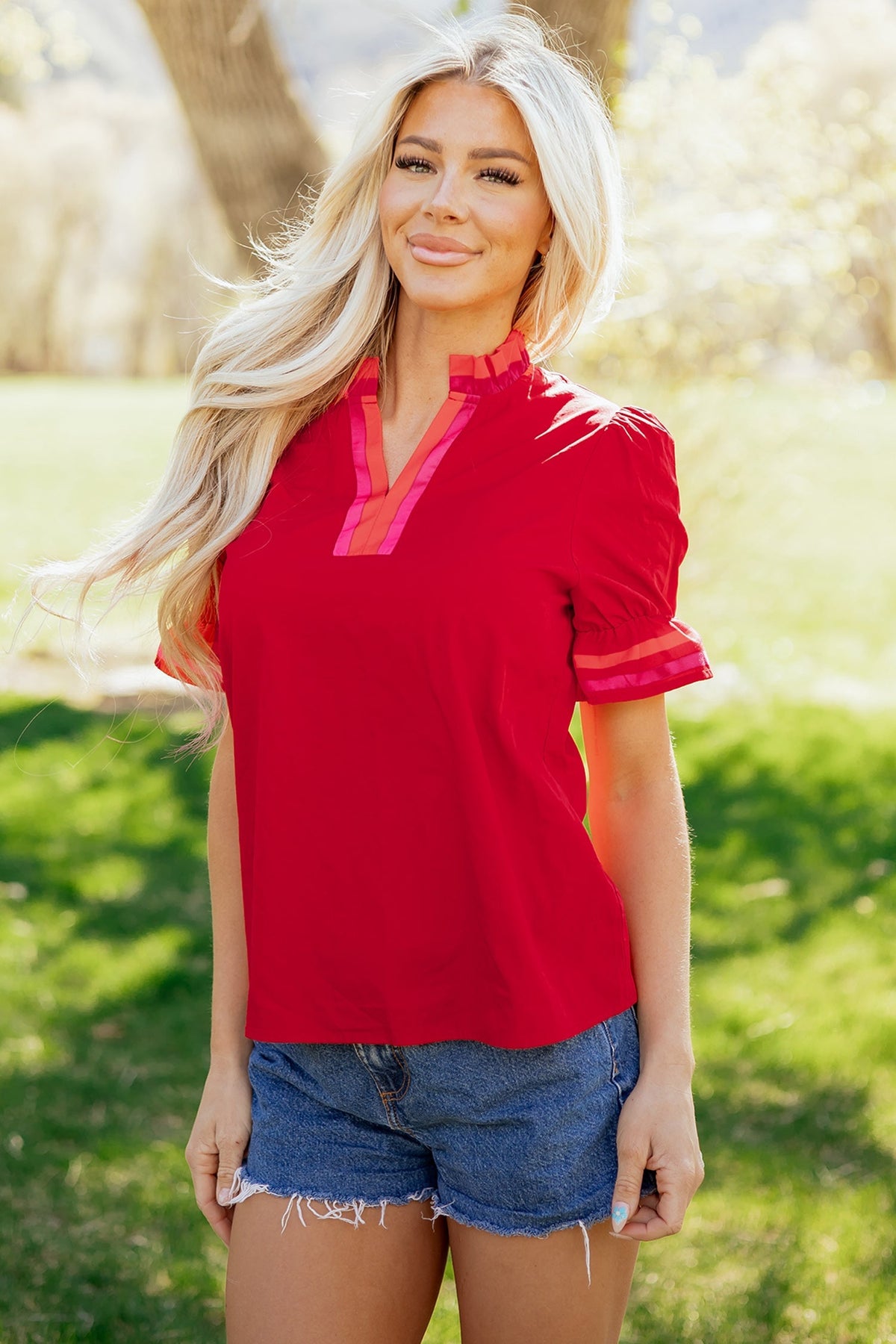 Fire red striped blouse with ruffled collar and short puffed sleeves