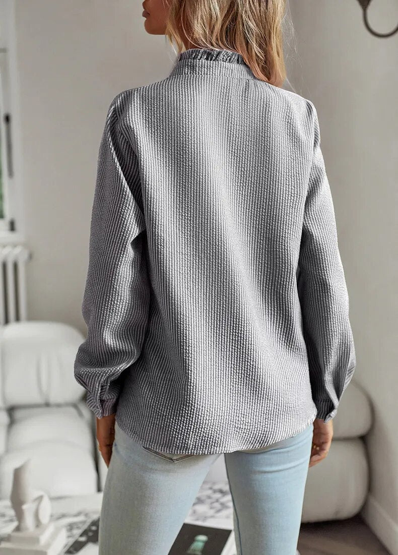 Women's long-sleeve blouse with ruffles