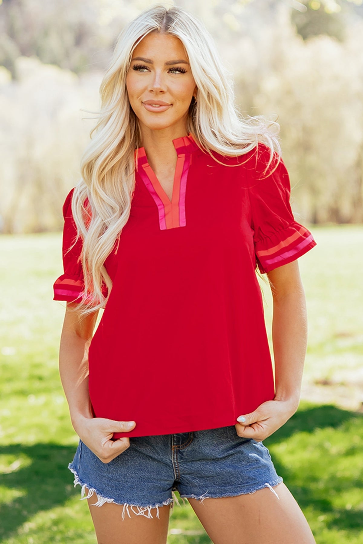 Fire red striped blouse with ruffled collar and short puffed sleeves