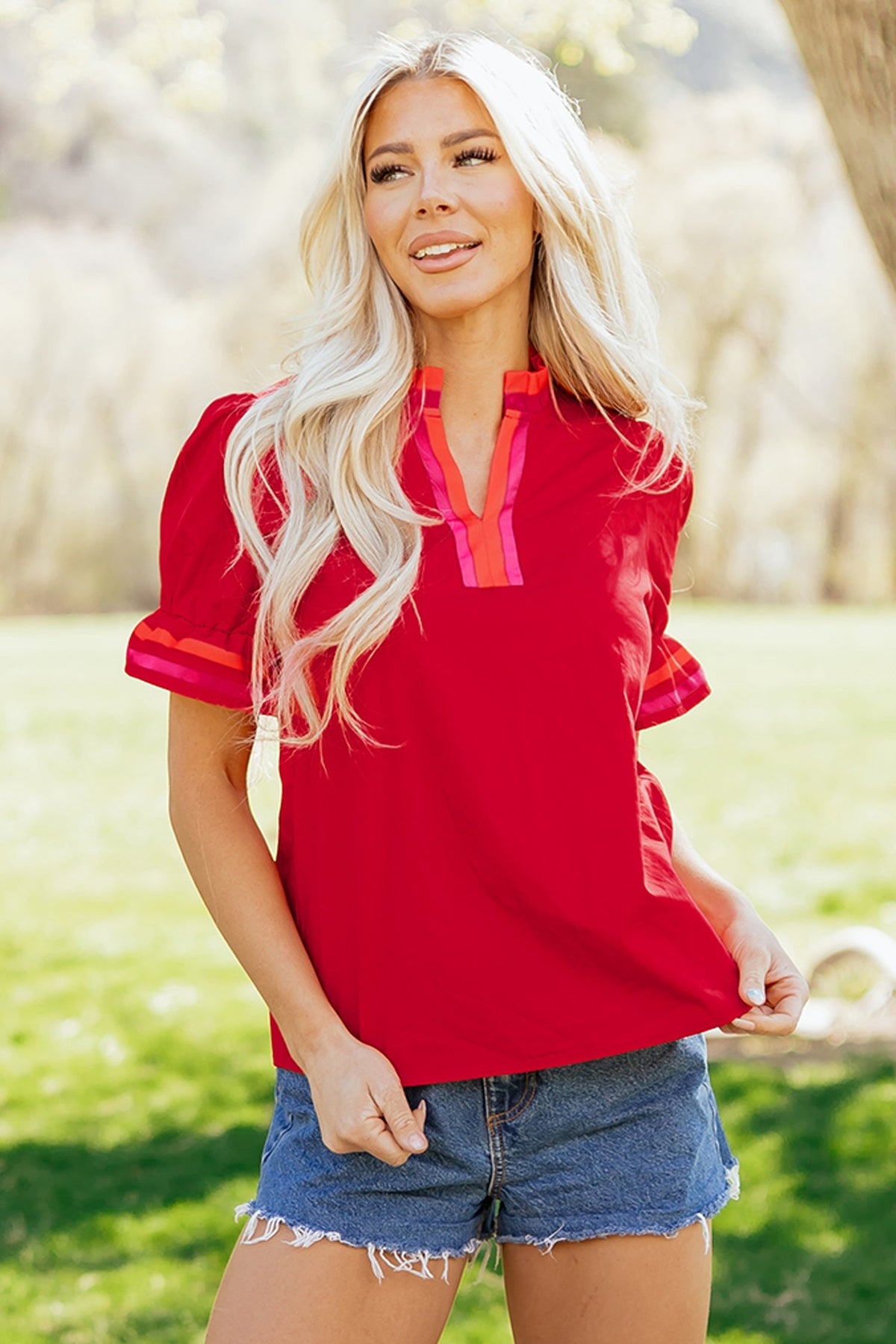 Fire red striped blouse with ruffled collar and short puffed sleeves