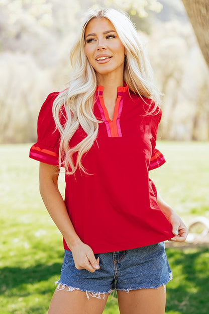 Fire red striped blouse with ruffled collar and short puffed sleeves